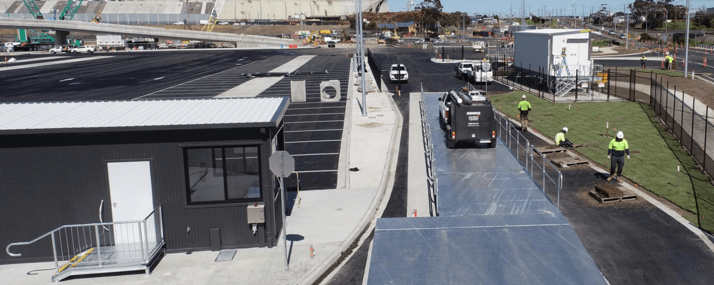 A detailed color image showcasing a Gendio weighbridge in use, highlighting its precision in weighing and robust design suited for various applications.